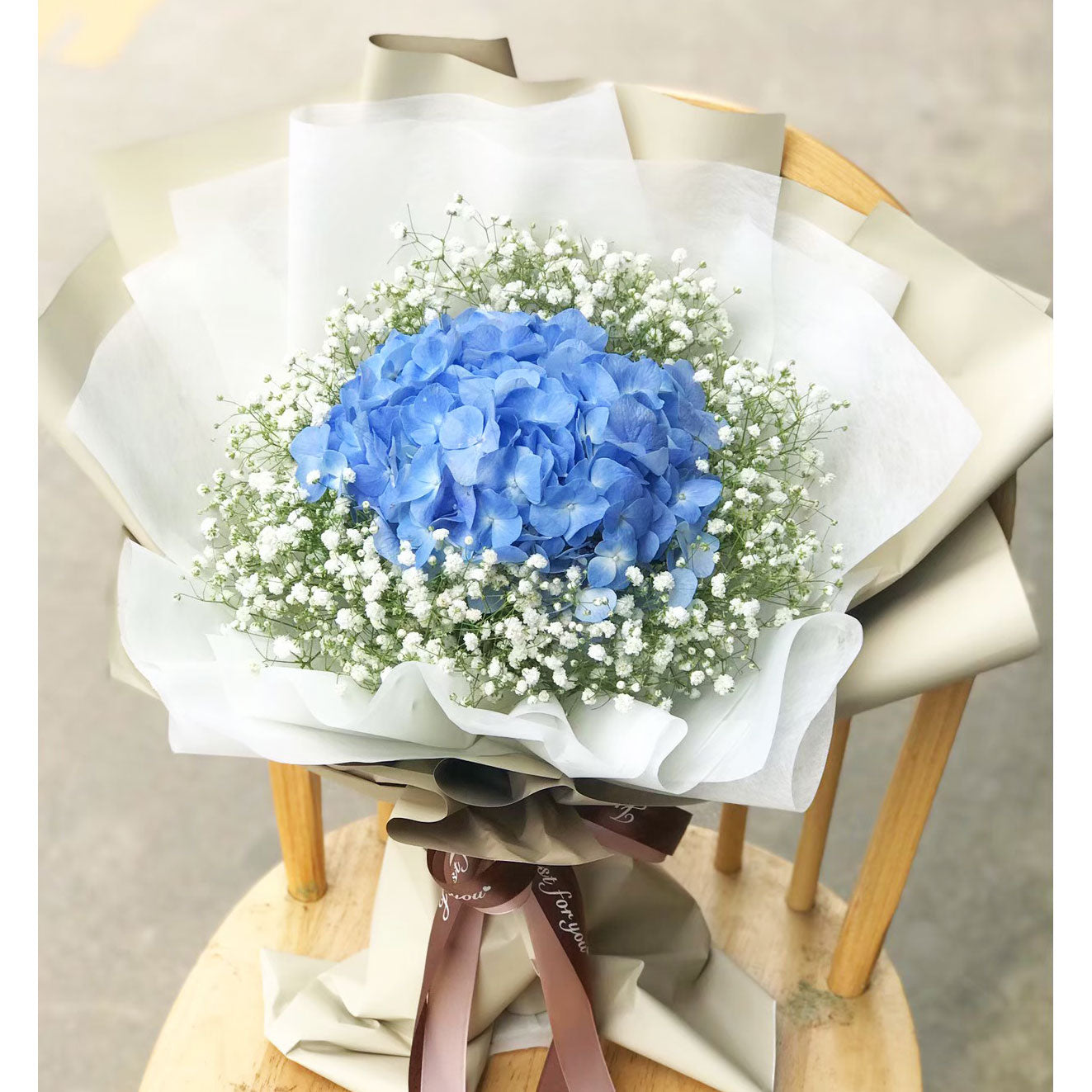 "Blue Love" bouquet of blue hydrangea and white gypso